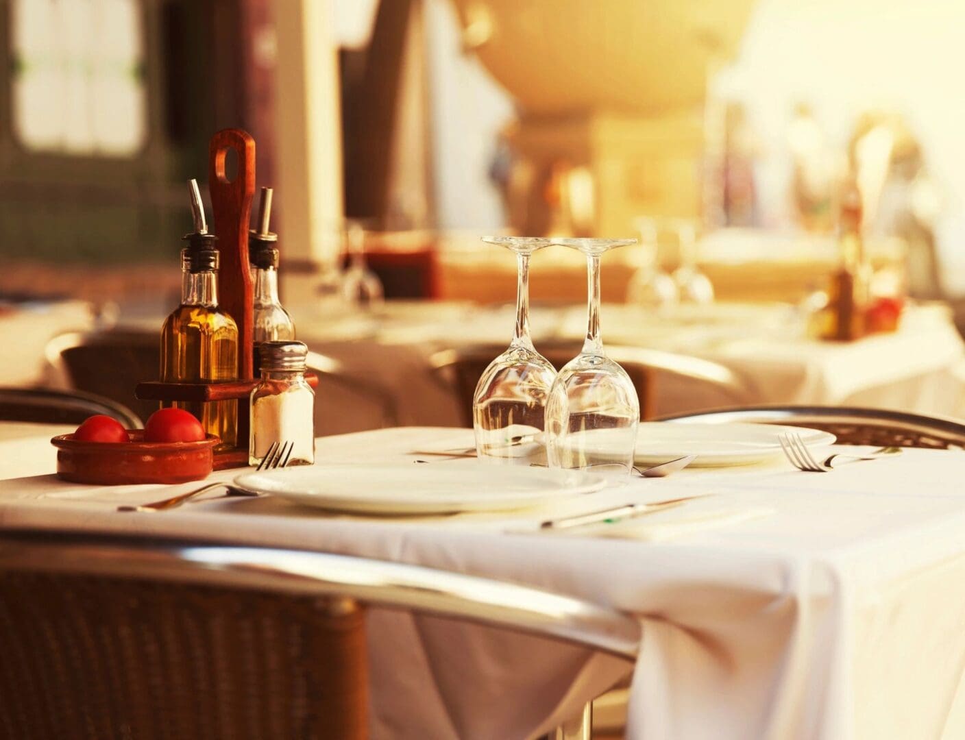 Restaurant in New York City Table with plates and liquor glasses